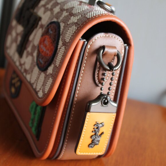 NWT Rogue Top Handle in Signature Textile Jacuard with Varsity Patches. - Picture 7 of 14